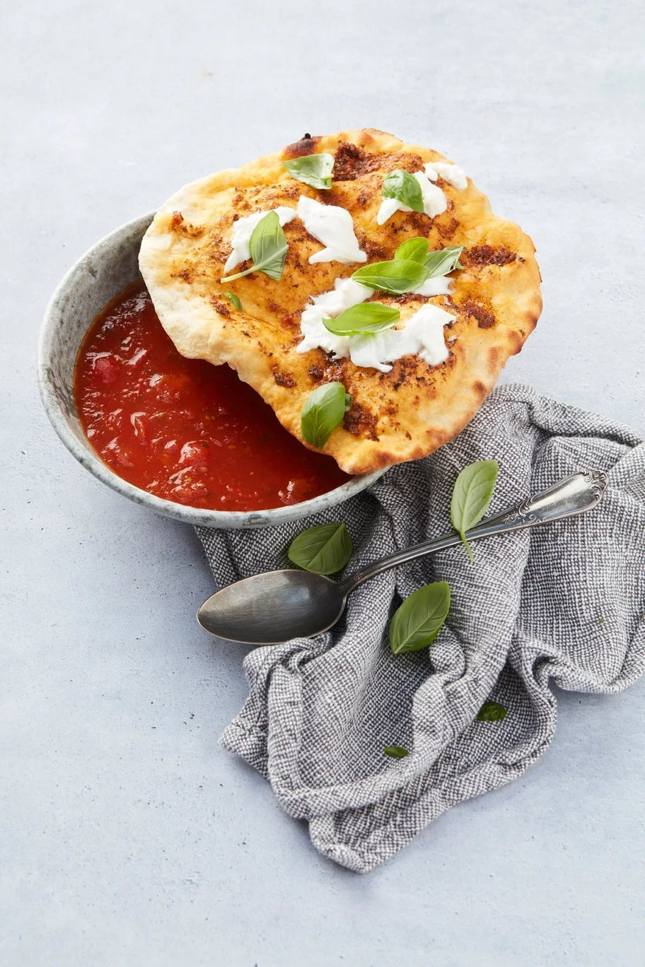 Tomato soup with pizza topping