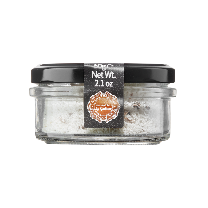 A glass jar containing truffle salt with a label indicating the product weight as 60 g (2.1 oz).